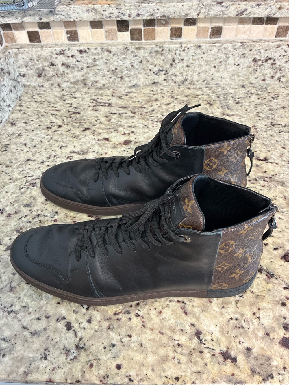 Louis Vuitton Line-Up sneaker boots in black leather and monogram canvas
